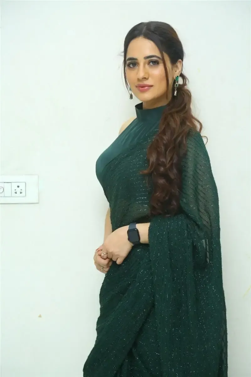 TOLLYWOOD ACTRESS PRIYANKA REWRI IN GREEN SAREE AT PREMA DESHAPU YUVARANI MOVIE 8